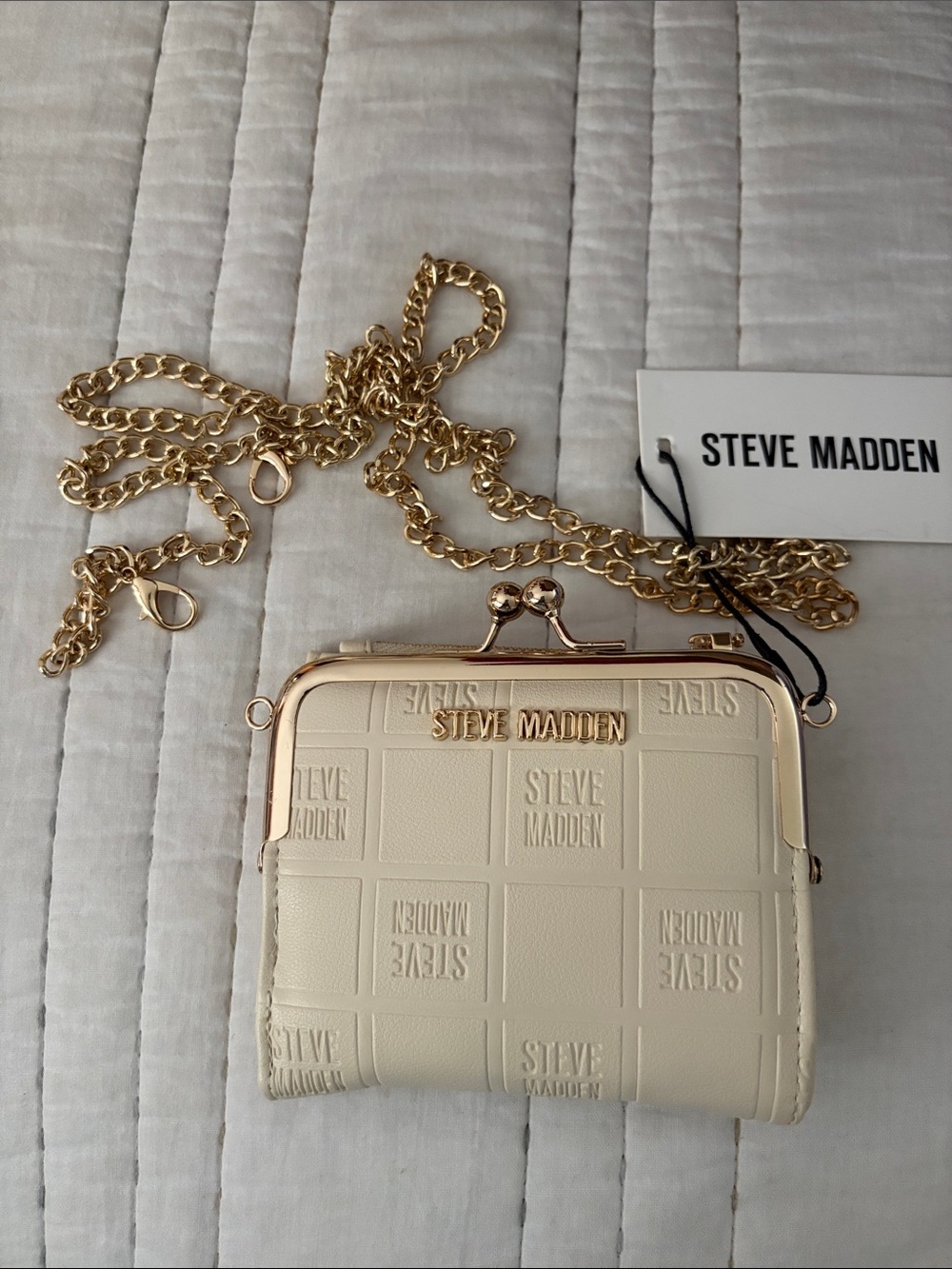 Steve Madden Cream Embossed Logo Crossbody Bag. 5” x 4” x .75” NWT